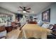 Spacious main bedroom with sitting area and hardwood floors at 4817 Ocean Blvd, Sarasota, FL 34242