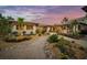 Landscaped front yard with walkway to entrance at 4817 Ocean Blvd, Sarasota, FL 34242