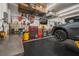 Well-organized garage featuring tool storage and shelving at 4817 Ocean Blvd, Sarasota, FL 34242