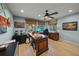 Home office with large desk and hardwood floors at 4817 Ocean Blvd, Sarasota, FL 34242