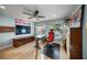 Home office with red chair and hardwood floors at 4817 Ocean Blvd, Sarasota, FL 34242