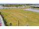 Aerial view of open green space with soccer goals in a residential community at 5107 Coral Reef Way, Bradenton, FL 34211