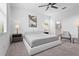Bright and airy main bedroom with a king-size bed, and en-suite bathroom access at 5107 Coral Reef Way, Bradenton, FL 34211