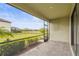 Private screened porch with backyard and water view at 5107 Coral Reef Way, Bradenton, FL 34211