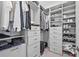 Large walk-in closet with ample shelving and drawers for storage at 5107 Coral Reef Way, Bradenton, FL 34211