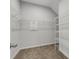 Spacious walk-in closet with wire shelving and ample storage at 5658 Silverbridge Trl, Bradenton, FL 34211