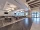 Elegant community dining room with herringbone floors at 7675 Summerland Cv, Bradenton, FL 34202