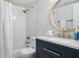 Elegant bathroom with a modern vanity and gold fixtures at 1007 Gulf N Dr # 106, Bradenton Beach, FL 34217
