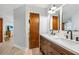 Modern bathroom with double vanity and updated fixtures at 1007 Gulf N Dr # 106, Bradenton Beach, FL 34217