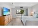 Spacious main bedroom with a king bed and stunning views at 1007 Gulf N Dr # 106, Bradenton Beach, FL 34217