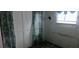 Small bedroom with white walls and tiled floors at 10315 Cortez W Rd # 47-2, Bradenton, FL 34210