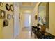 Bright entryway with decorative mirrors and a console table at 1035 Bradberry Dr, Nokomis, FL 34275