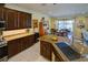 Modern kitchen with granite countertops and stainless steel appliances at 1035 Bradberry Dr, Nokomis, FL 34275