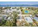 Aerial view of house, neighborhood, and tennis court at 1524 2Nd E Ave, Bradenton, FL 34208