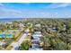 Aerial view of house, neighborhood, and tennis court at 1524 2Nd E Ave, Bradenton, FL 34208