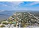 Aerial view showcases Bradenton's waterfront, residential areas, and a tennis court at 1524 2Nd E Ave, Bradenton, FL 34208