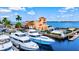 Aerial view of a waterfront restaurant and luxury yachts at the marina at 1524 2Nd E Ave, Bradenton, FL 34208