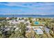 Aerial view of house, neighborhood, and tennis court at 1524 2Nd E Ave, Bradenton, FL 34208