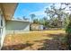 Large backyard with shed and mature trees at 1524 2Nd E Ave, Bradenton, FL 34208