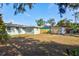 Spacious backyard with shed and wooden fence at 1524 2Nd E Ave, Bradenton, FL 34208