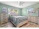 Spacious bedroom with light walls, ceiling fan, and large closet at 1524 2Nd E Ave, Bradenton, FL 34208