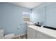 Laundry room with washer, dryer, sink, and built-in shelving at 1524 2Nd E Ave, Bradenton, FL 34208