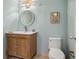 Updated bathroom with wood vanity, modern fixtures and a light color scheme at 2155 Wood St # B17, Sarasota, FL 34237