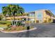Attractive condo building with palm trees and ample parking at 2155 Wood St # B17, Sarasota, FL 34237