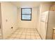 Small dining area with tile floor and window at 226 Lakewood Dr # 226, Bradenton, FL 34210