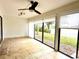 Serene lanai with lake view and white shades at 226 Lakewood Dr # 226, Bradenton, FL 34210