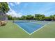 Well-maintained pickleball courts with seating area at 226 Lakewood Dr # 226, Bradenton, FL 34210