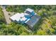 Modern home nestled in tropical landscape at 269 Pine Ranch Trl, Osprey, FL 34229