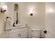 Small bathroom with a corner sink and updated fixtures at 269 Pine Ranch Trl, Osprey, FL 34229