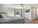 Spacious bedroom with wood-look floors and en-suite bathroom at 269 Pine Ranch Trl, Osprey, FL 34229