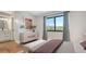 Bright bedroom with a comfortable bed and en-suite bathroom at 269 Pine Ranch Trl, Osprey, FL 34229