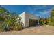Modern detached garage with paver driveway at 269 Pine Ranch Trl, Osprey, FL 34229