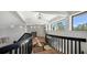 Modern hallway with hardwood floors and natural light at 269 Pine Ranch Trl, Osprey, FL 34229