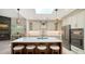 Modern kitchen with white cabinets, quartz counters, and a large island at 269 Pine Ranch Trl, Osprey, FL 34229