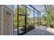Outdoor shower next to the pool and screened patio at 269 Pine Ranch Trl, Osprey, FL 34229