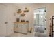 Convenient wet bar with wine storage and additional cabinet space at 269 Pine Ranch Trl, Osprey, FL 34229