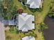Aerial view of single-Gathering home with tile roof, situated near water at 310 Wexford Ter # 164, Venice, FL 34293