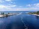 Aerial view of Venice inlet, showing boat and calm waters at 310 Wexford Ter # 164, Venice, FL 34293