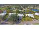 Aerial view of community with houses, golf course, and lakes at 310 Wexford Ter # 164, Venice, FL 34293