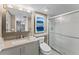 Updated bathroom with walk-in shower and modern fixtures at 310 Wexford Ter # 164, Venice, FL 34293