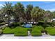 Venice Beach park entrance with lush landscaping and signage at 310 Wexford Ter # 164, Venice, FL 34293