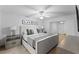 Comfortable bedroom with a king-size bed and nightstands at 310 Wexford Ter # 164, Venice, FL 34293