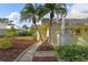 Landscaped walkway leading to house entrance at 310 Wexford Ter # 164, Venice, FL 34293
