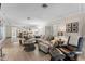 Relaxing living room with sectional sofa and leather recliner at 310 Wexford Ter # 164, Venice, FL 34293