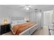 Spacious main bedroom with king-size bed and ample closet space at 310 Wexford Ter # 164, Venice, FL 34293
