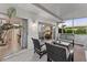 Peaceful screened patio with comfortable seating and views of the surrounding area at 310 Wexford Ter # 164, Venice, FL 34293